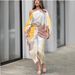 Women's Clothing Printed Lantern Sleeve Loose Top Tassel Hem Skirt Fashionable Casual Two-piece_ecoleips.com