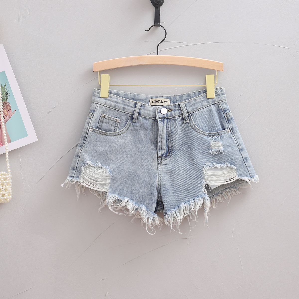 High Count Ripped And Fringed Denim Shorts for Women Trendy Hot Pants Summer Fashion Must-Have Stylish A-Line Mini Skirt for Bloggers_ecoleips.com