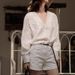 Liangyixuan 2024 Summer High-End Style New Chinese V-Neck Beaded Crochet Exquisite White Shirt Top For Women_ecoleips.com
