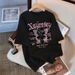 plus Size Women's Short Sleeve T-Shirt Cute Cartoon Print Flowy Loose Fit Tummy Control Casual Top for Curvy Figures_ecoleips.com