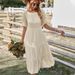 European And American Solid Color Casual Vacation Dress 2026 Spring/Summer Round Neck Flared Skirt With Ruffles_ecoleips.com