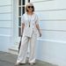 2026 Women's Summer 2-Piece Set European American Style Cross-Over Striped Short Sleeve Shirt Loose Trousers Outfit_ecoleips.com