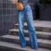 Women's High-Waisted Button-Fly Jeans – Raw Hem Distressed Denim Pants, Loose Fit Streetwear Style (Blue, S-4XL)_ecoleips.com