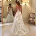 Elegant Off-Shoulder Deep V-Neck Lace Wedding Dress With Slim Fit & Cathedral Train – Available In White & Ivory_ecoleips.com
