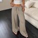 2025 Summer New Women's Casual Solid Color Textured Fabric Knotted Waist Oblique Pocket Wide Leg Pants_ecoleips.com