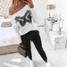 Women’s Clothing Spring and Summer New Casual Contrast Off shoulder Denim Butterfly Decorated Long sleeved Top Color blocked Pants Two piece Set_ecoleips.com