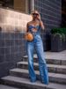 Women's High-Waisted Button-Fly Jeans – Raw Hem Distressed Denim Pants, Loose Fit Streetwear Style (Blue, S-4XL)_ecoleips.com