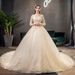 Champagne Lace Long Sleeve Wedding Dress With Cathedral Train, Plus Size Bridal Gown For Elegant Bride, Flowy A-Line Silhouette_ecoleips.com