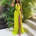 Verve 2025 New Women's Hollow Knot Slit Deep V-neck Irregular Dress_ecoleips.com