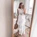 2025 Summer European And American Women's New Knitted Hollow Irregular Sleeveless Casual Skirt Set_ecoleips.com