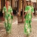 "Trendy Floral Print V-Neck Jumpsuit – Lightweight Short Sleeve Romper For Women (Sizes S-XL, Green)"_ecoleips.com