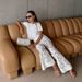 Jacquard Bell Bottom Pants European And American 2025 Spring And Summer New Women's Jacquard Lace Flower Hollow Slim Flared Pants_ecoleips.com