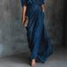 2025 Independent Website European And American Women's Autumn Elegant And Sexy Solid Color Irregular Pleated Pocket Long Skirt_ecoleips.com
