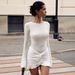 2024 Autumn Women's New Fashion Round Neck Long Sleeve Slimming Wrinkle Twisted Short Bag Hip Dress_ecoleips.com