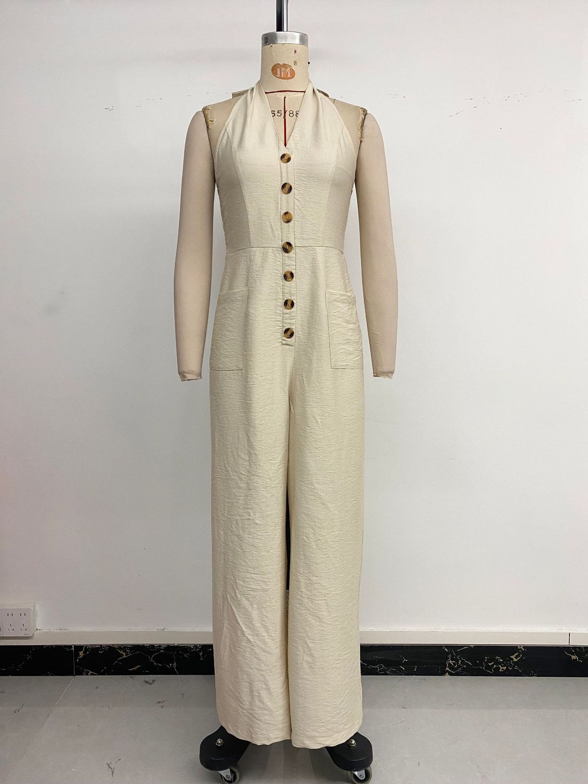 K New Simple Vacation Slimming Over-the-shoulder Solid Wide-leg Bodysuit_ecoleips.com