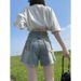 2025s Women's Summer New Versatile Slimming High-Waisted Hip-Hugging Loose Frayed A-Line Hot Pants_ecoleips.com