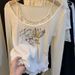 Sweet Korean Y2k Lace Long-sleeved T-shirt Female Fall Outside The Design Sense Printing Slim Thin False Two Pieces Of Tops_ecoleips.com