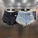 2025 Summer New French Retro Style Lace Patchwork Ripped Raw Edge Faux Two-Piece Slimming Denim Shorts_ecoleips.com