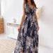 The Women's Spring And Summer Backless Printed Strappy Dress Is Elegant_ecoleips.com