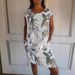 Women's Clothing Round Neck Loose Short Sleeve Printed Pocket Dress_ecoleips.com