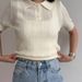 "Women's Lace-Knit Short Sleeve Top - Cutout Collar Design, Breathable Summer Knitwear, Unique Y2K-Inspired Blouse (Ivory/Black)"_ecoleips.com