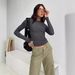 2026 European And American Women's Fashion Autumn Versatile Irregular Base Shirt T-Shirt Round Neck Solid Color Slim-Fit_ecoleips.com
