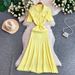 Elegant Pearl Button Detail Knitted Long Dress for Women Gentle Fit Slim Fit Pleated New Style 2026_ecoleips.com