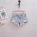 High Count Ripped And Fringed Denim Shorts for Women Trendy Hot Pants Summer Fashion Must-Have Stylish A-Line Mini Skirt for Bloggers_ecoleips.com