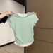 A Fresh, Light-Blue Short-Sleeved Top Made Of Modal Fabric With A Bold Color Contrast Perfect For Summer Wear. It Feat_ecoleips.com
