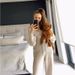 European And American 2025 Casual Fashion Women's Solid Color Cardigan Long Sleeved Sweater Trousers Two Piece Suit_ecoleips.com