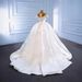 Elegant Satin Wedding Dress With Beaded Details And Flowing Train, Luxurious Bridal Gown For Women_ecoleips.com