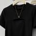 This Summer's Black Women's T-Shirt Features A Curved Hem Design, A Slimming Silhouette, A Perforated Pattern For Added_ecoleips.com
