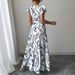 2025 Spring Summer New Printed Ruffle V-neck Sexy Slim Fit Long Dress Gown_ecoleips.com