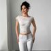 European And American 2025 Summer New Women's Sequined Mesh Off Shoulder Bow Pleated T Shirt Top_ecoleips.com