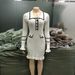 Women's Clothing Long Sleeved Lapel Button Wood Ear Edge Knitted Dress_ecoleips.com