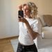 Women's French-Inspired Oversized T-Shirt Flowy Summer Top Slimming Fit Sweet-Spicy Shoulder Detail_ecoleips.com