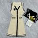 2026 Spring/Summer New Arrival: Elegant Camellia Color Blocked Collar, Button Down Sleeveless Knit Dress With A Light Luxury, Sophisticated Style_ecoleips.com