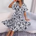 2025 Style Independent Women's Sexy V-neck Bohemian Long Sleeved Dress_ecoleips.com