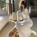 Women's Clothing hollow knitted top skirt two piece suit fashionable and age reducing temperament early spring wear a complete set_ecoleips.com