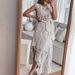 2025 Summer European And American Women's New Knitted Hollow Irregular Sleeveless Casual Skirt Set_ecoleips.com