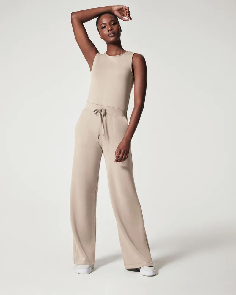 Summer 2023 Women's Sleeveless Slimming Jumpsuit Solid Color Versatile Tethered European American Style Foreign Trade_ecoleips.com