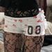 2025 Spring Digital Cherry Printed Folded Lotus Leaf Edge Design Features Slim Fit Elastic Casual Shorts for Women_ecoleips.com