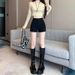 Wearing Black Shorts For Women In Spring And Summer 2026 New High Waisted Slimming Outfit Paired With Boots American Style Spicy_ecoleips.com