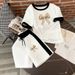 Women's Luxury Style Gold Rhinestone Studded Two Piece Set Short Sleeve Top And Shorts Casual Outfit With Large Bow Print_ecoleips.com