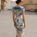 2026 European And American Cross-border Independent Site Holiday Elegant Abstract Print Ruched Cowl Neck Dress_ecoleips.com