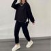European American In-stock 2025 New Fashion Metal Button Split Long-sleeve Top And Sporty Casual Slim-fit Pants Women's_ecoleips.com