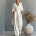 Elegant V-Neck Waist-Defining Jumpsuit For Women - Chic Wide-Leg Romper With Ruffle Detail Flattering V-Neckline_ecoleips.com