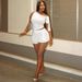 Women's European American Style Solid Color Asymmetrical Neck Sleeveless Top And Slim Fit Shorts Two Piece Set Fashion Summer 2025_ecoleips.com
