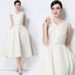 Elegant V-Neck Sleeveless Cocktail Dress With Oversized Bow & Cinched Waist – Flowing Skirt & Belt Included_ecoleips.com