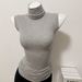 Slim-Fitting Sleeveless Top for Women Chic Solid Color Turtleneck T-Shirt Show off Great Figure_ecoleips.com